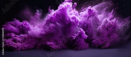 A cumulus cloud of electric blue and magenta hues rises from the ground, creating a striking contrast with the purple sky