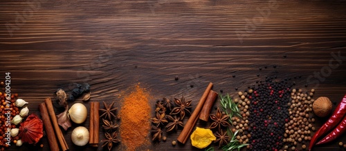 Various spices and herbs displayed on a wooden surface