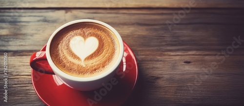 Coffee cup with heart symbol