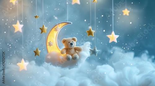 A baby mobile with a teddy bear on the moon and stars against a soft foggy background