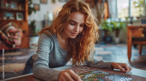Young woman deeply focused on puzzle solving at home