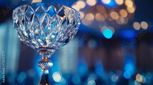 An ornate crystal trophy, symbolizing business excellence, takes center stage at an annual corporate awards ceremony