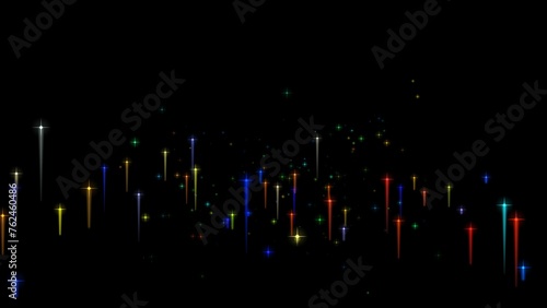 Colorful of flying glowing particles on black background. Particles in motion move slowly through space. Colorful flying lines of bright particles.
