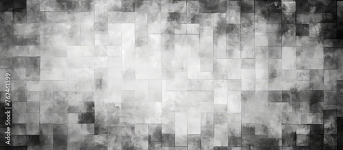 A blackandwhite monochrome photography of a cityscape with a grid pattern on a grey background, creating a symmetrical landscape with grass squares