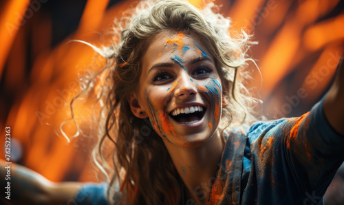 Portrait of a passionate female Dutch fan celebrating at a UEFA EURO 2024 football match, her face painted with the colors and patterns of the Dutch flag, radiating enthusiasm and national pride