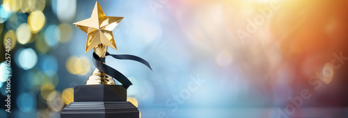Golden award trophy star on a bokeh background, space for text, copyspace banner winner and 1st place concept, hd