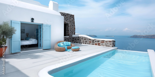 sunlit terrace with pool on Santorini Island in Greece, Mediterranean sea, traditional white and blue design