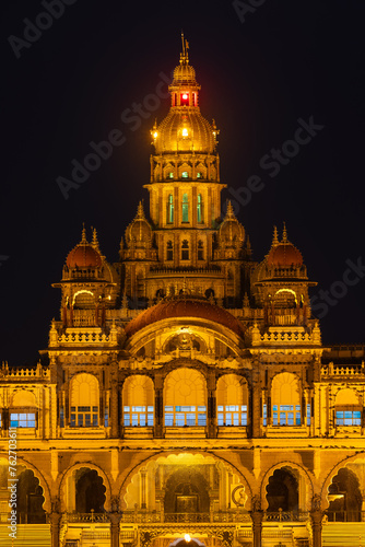 Historic Mysore Maharaja palace illuminated in the night time in India.