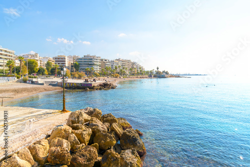 The scenic waterfront beach and promenade of Flisvos along the Athenian Riviera at the seaside town of Palaio Faliro, Greece.