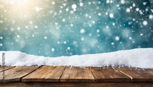 empty dark wooden table and snow background