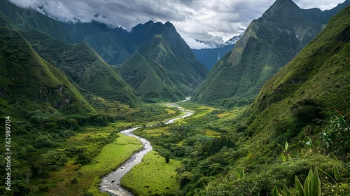 A winding river cutting through a lush valley