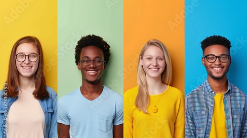 Four young on a colorful plain background, young interacials