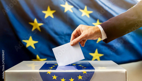 Closeup of a male hand inserting a ballot to European Union ballot box with EU flag colors and stars. European Union elections concept. Generative Ai.