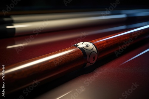 Close up of a pool cue on a table, suitable for sports and leisure concepts