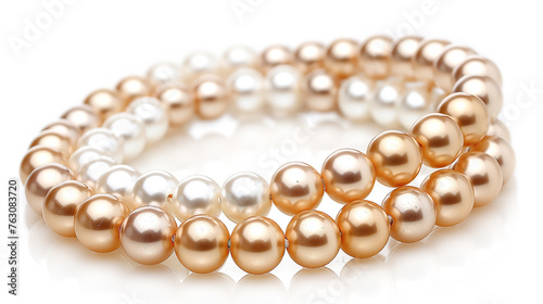 A gold and white pearl bracelet with a white and gold pearl