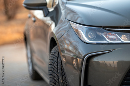 Close-up of the headlights of a modern car. Selective focus.