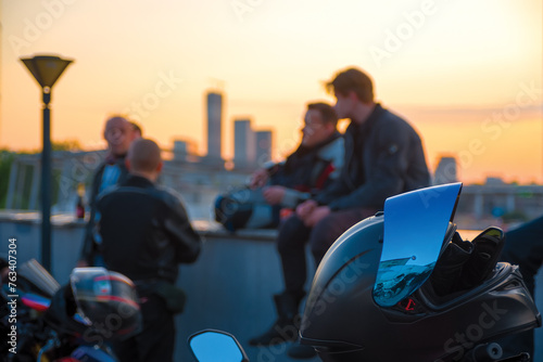 Motorbike helmet against defocused riders