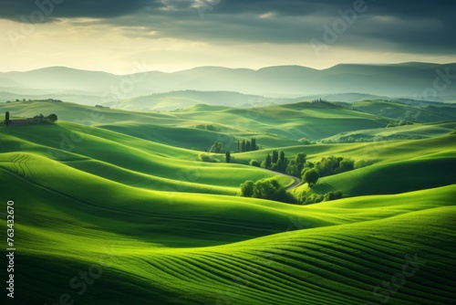 Aerial view of lush green fields and rolling hills serving as a calming background