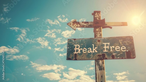 Break free word and arrow signpost on clear sky background. Motivational sign. Vintage style.