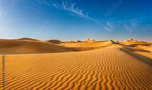 sand dunes in the desert on a beautiful sunny day with blue sky wallpaper 