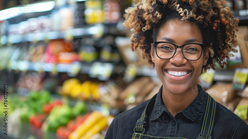 Portrait of beautiful Smiling female supermarket worker.