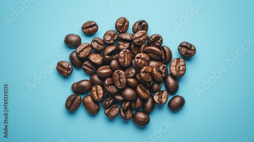 This vibrant image showcases a scattering of aromatic coffee beans on a striking blue backdrop, creating a sense of rejuvenation and tranquility within a contemporary cafe setting.