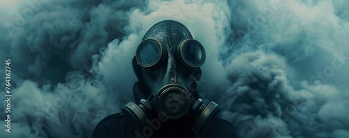 Mysterious person in gas mask amidst fog