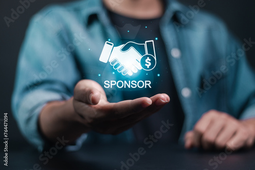 Sponsorship concept. Business between fund sponsors Resources or services. Businessman showing sponsor icon on virtual screen.