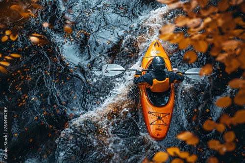 A kayaker clad in vibrant gear conquers turbulent river rapids, surrounded by autumn foliage.