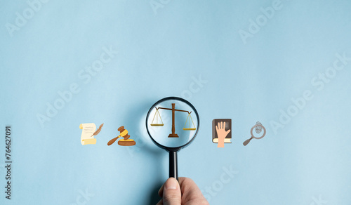 Concept of legal advice in companies. Magnifying glass with law icon for business legal advice, labor law. Lawyer, labor justice.