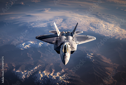 Military fighter jet flies over the mountains