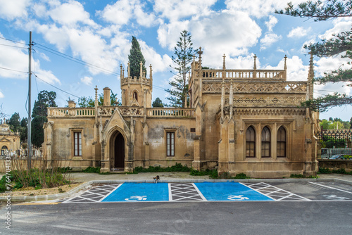 Paola, Malta - January 28th 2022: The Gatehouse at the entrance of the Santa Maria Addolorata Cemetery also known as the Addolorata Cemetery. 