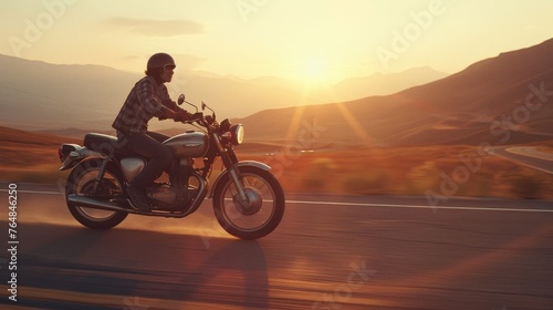 motorcyclist riding a bike free on a desert roadr landscape