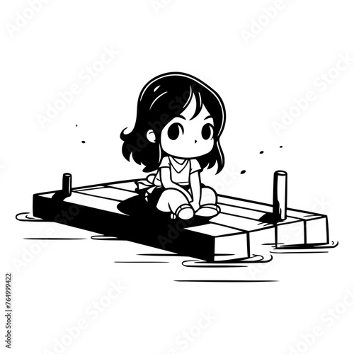 girl sitting on a wooden pontoon in the water