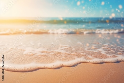 Beautiful sunset on a sandy beach, by the sea. Natural summer water background. 