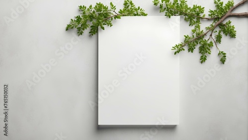 blank notebook and branche of tree on white background with copy space, space for text and design 