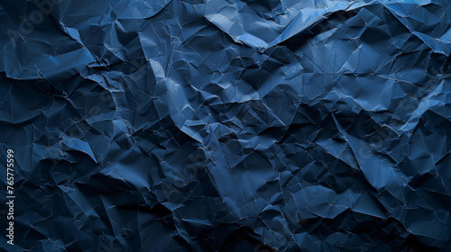 Rough navy blue paper texture. Blue crumpled paper texture and background. Close up view of wrinkled navy blue texture. Grunge texture surface paper page material for vintage design. letter paper