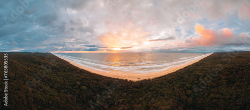 High angle aerial drone view of famous Seventy Five Mile Beach, 75 mile beach on Fraser Island, Kgari, Queensland, Australia, shortly before sunset