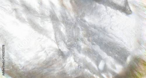 panoramic background made of natural mother-of-pearl surface close up