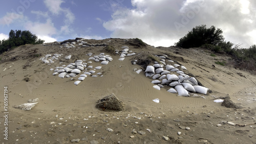 Sandbag Barricade on a Beach Dune Against Climate Change