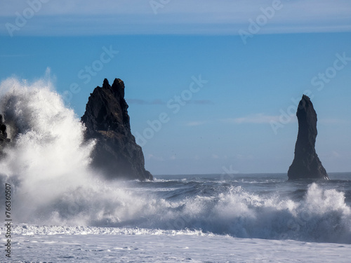 Waves crashing against basaltic rocks on Reynisfjara beach