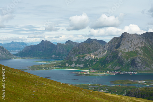 Amazing view of the beach and a mountain of village Ramberg in Lofoten islands, Nordland, Norway. Rambergstranda beach with dramatic mountains and peaks and sea. Backpacking, hiking concept.