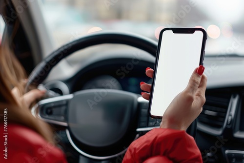 person Driver holding phone white screen on steering wheel background