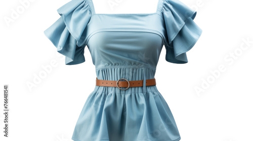 A woman exudes grace in a flowing blue dress complimented by a chic brown belt