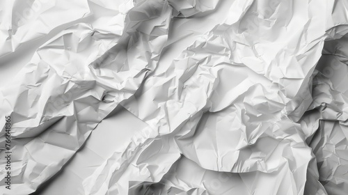 the smoothness of paper disrupted by the chaos of crumpling, frozen in time.