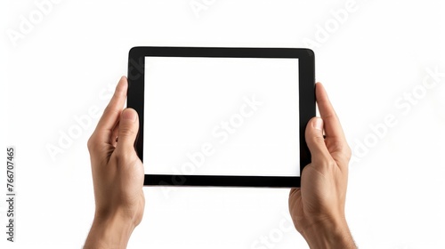 Human hands holding digital tablet with a white blank screen