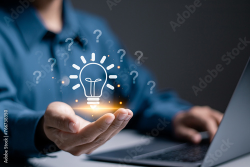 Question mark concept. Problem and solution. Quiz, test, survey, support, knowledge, decision. Businessman holding light bulb with question mark icon on virtual screen for FAQ.