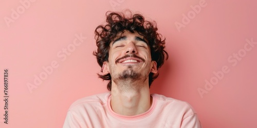 Relaxed South American Man on Pink Background