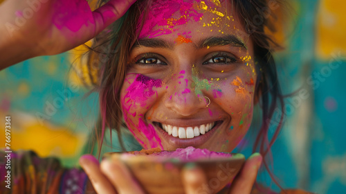Colorful Holi Gulal colors paints on face. 