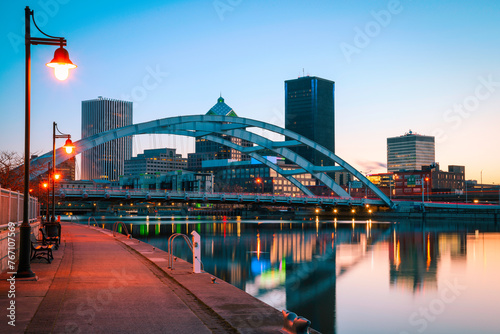 Rochester New York Skyline, Skyscrapers, Water Reflections, Court Street Bridge Arching over the Genesee River along the Boardwalk on the Genesee Riverway Trail at Twilight